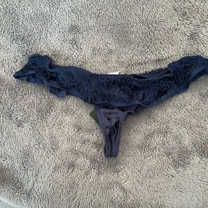 Andre’s Sarda fringe thong. M